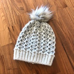 Woven beanie with poof